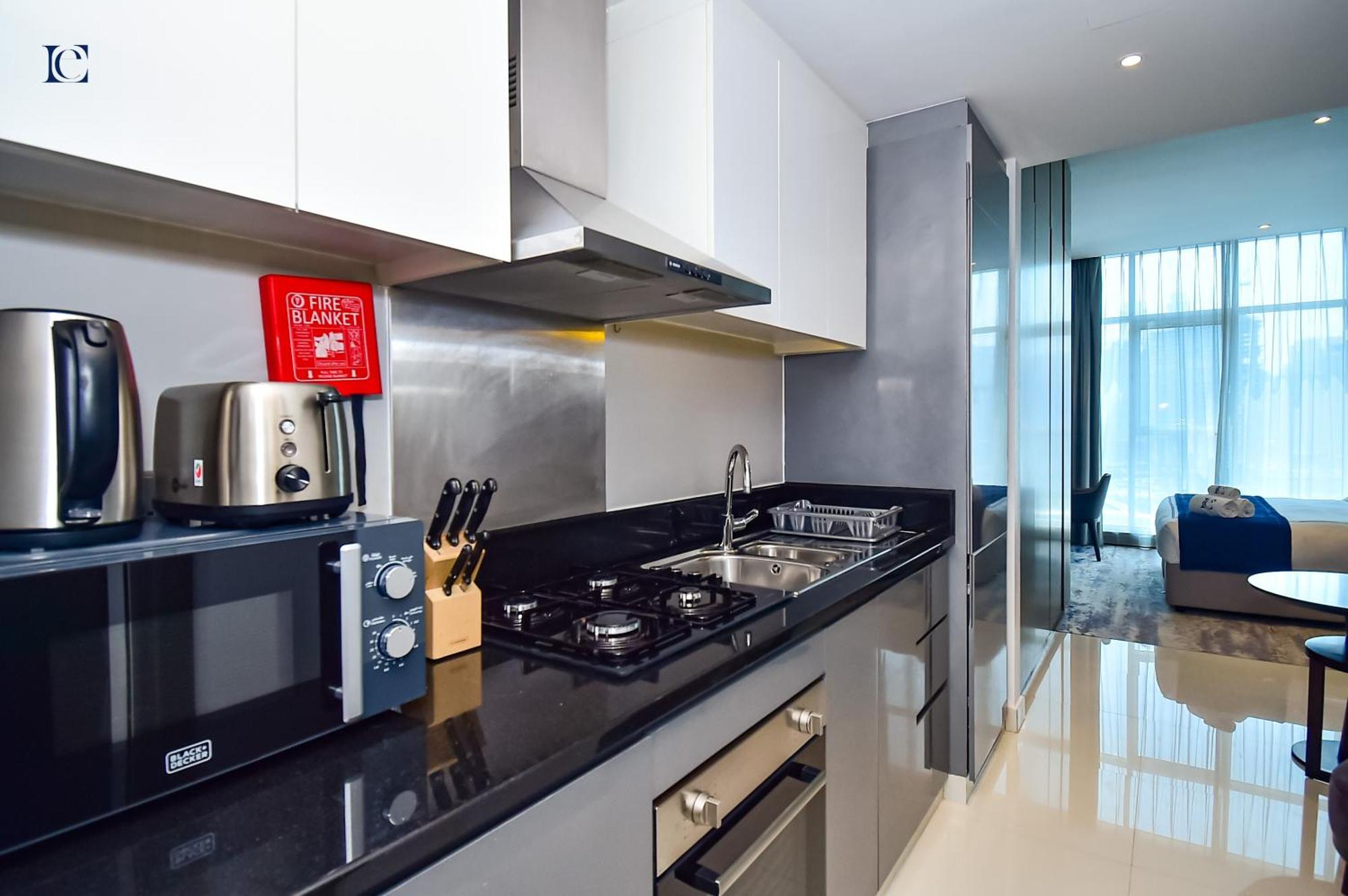 Luxury Escapes - Damac Maison Prive - Canal View Apts - Near Mall अपार्टमेंट